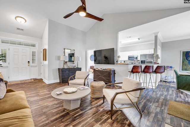 living room featuring wood-type flooring, high vaulted ceiling, and ceiling fan