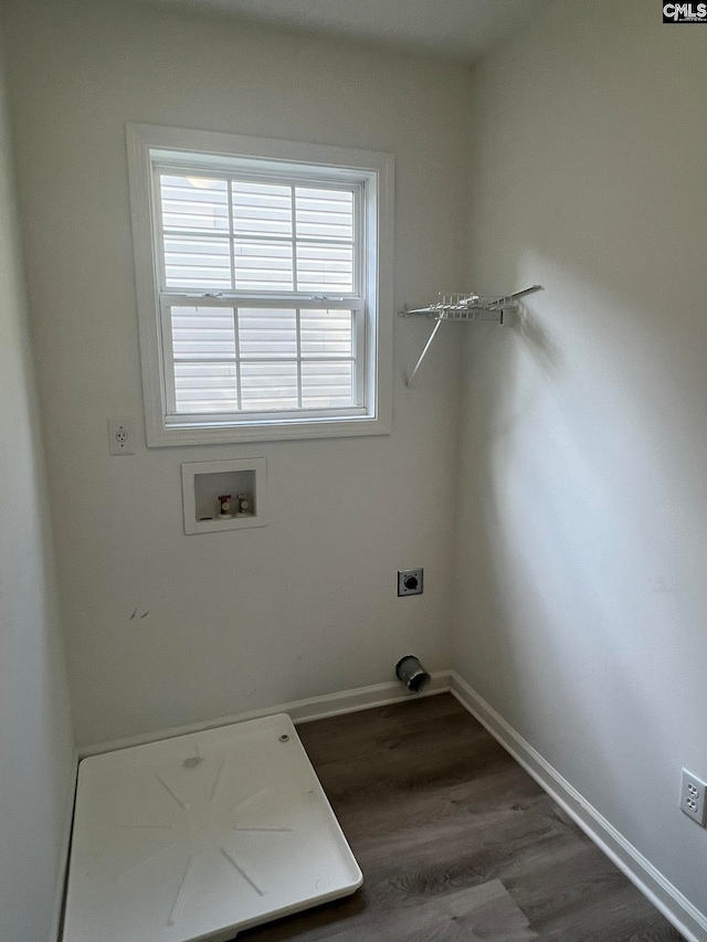 washroom featuring hookup for a washing machine, hookup for an electric dryer, and hardwood / wood-style flooring