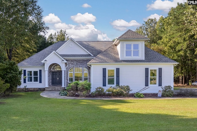 view of front of property with a front lawn