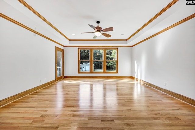 unfurnished living room featuring light wood-type flooring, ceiling fan, and crown molding