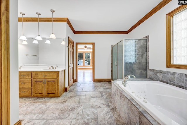 bathroom with vanity, ceiling fan, ornamental molding, and independent shower and bath