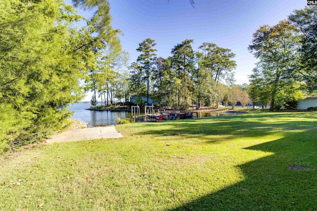 234 Turtle Trl, Leesville, SC 29070 - view of grassy yard with a water view and a dock