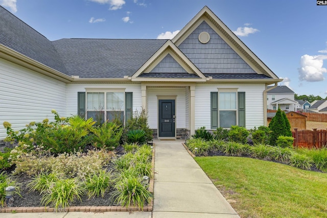 view of front facade with a front yard