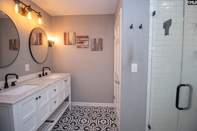 bathroom featuring vanity, walk in shower, and tile patterned flooring