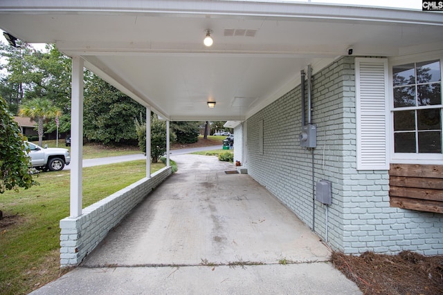 view of patio / terrace featuring a carport