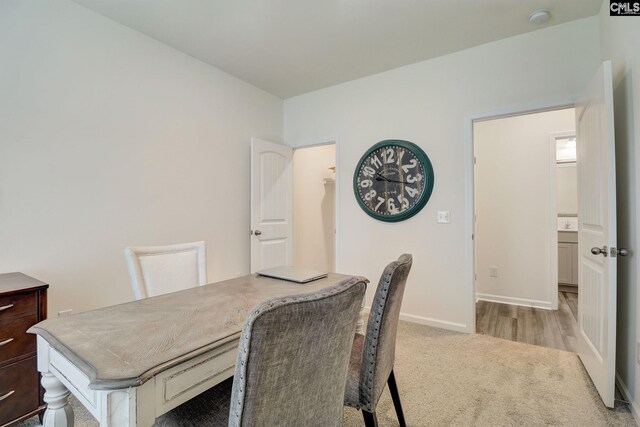 dining area with light wood-type flooring