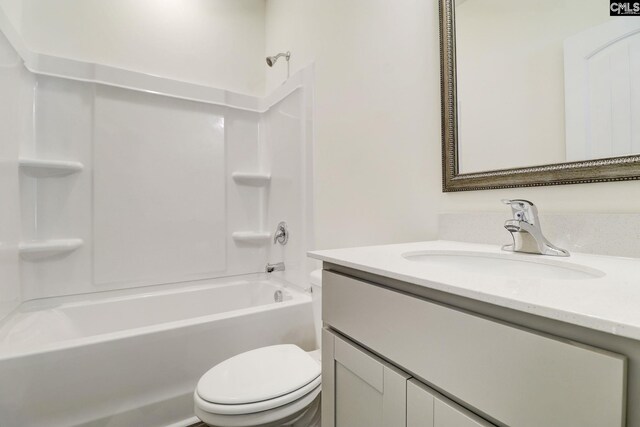 full bathroom featuring vanity, shower / bathtub combination, and toilet