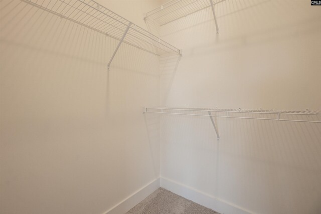 unfurnished room featuring ceiling fan, a raised ceiling, and crown molding