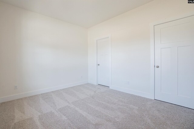 unfurnished living room featuring ceiling fan, crown molding, and a premium fireplace