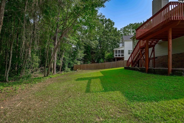 view of yard featuring a deck