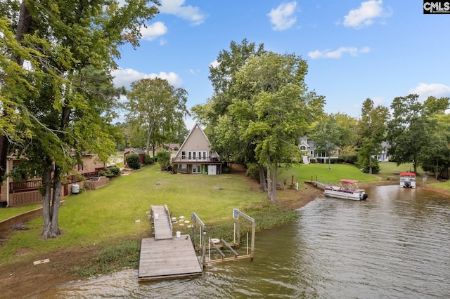 view of dock featuring a yard and a water view