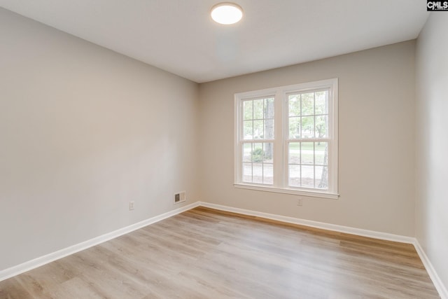 empty room featuring light hardwood / wood-style floors