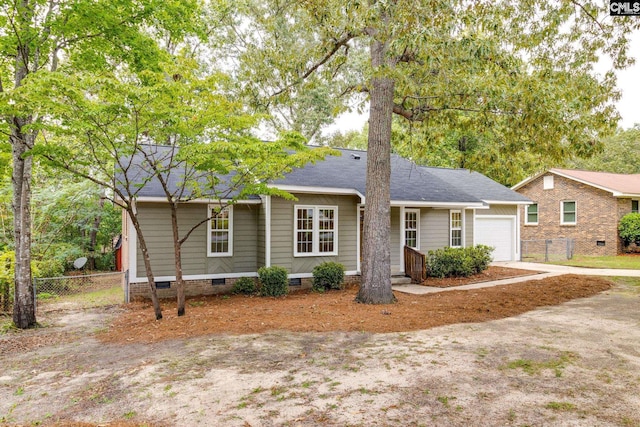 single story home featuring a garage