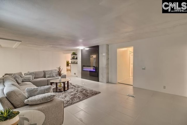 living room featuring light tile patterned floors