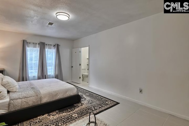 bedroom with a textured ceiling