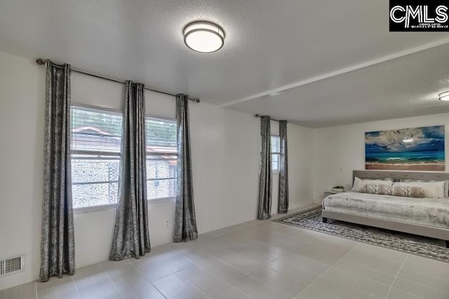 living room featuring light tile patterned floors