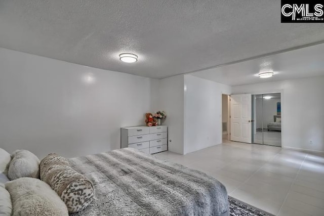 bedroom with a textured ceiling