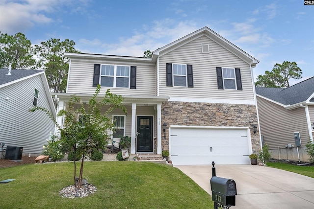 view of front facade featuring a garage, central AC, and a front yard