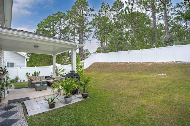 view of yard with outdoor lounge area and a patio area