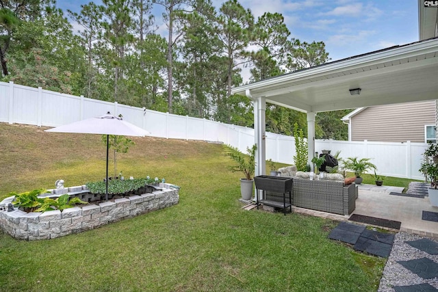 view of yard with a patio area