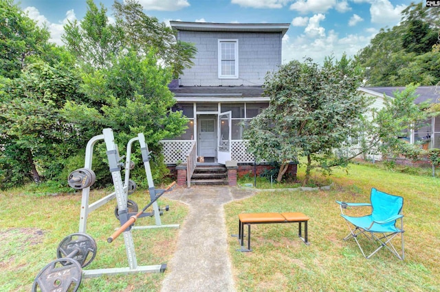 view of yard with a sunroom