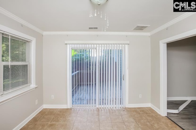 tiled empty room with crown molding