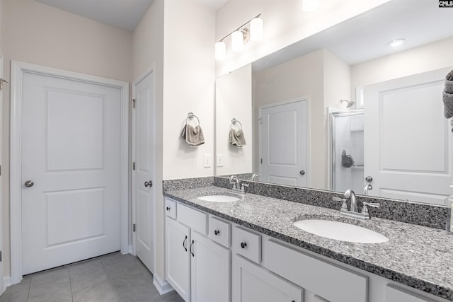 bathroom featuring vanity and tile patterned floors