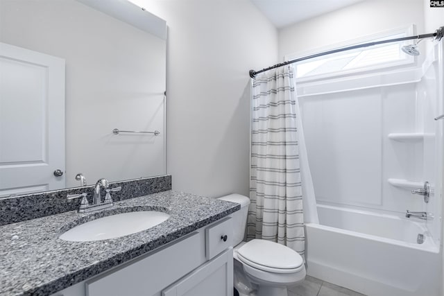 full bathroom with tile patterned floors, shower / bath combo, vanity, and toilet