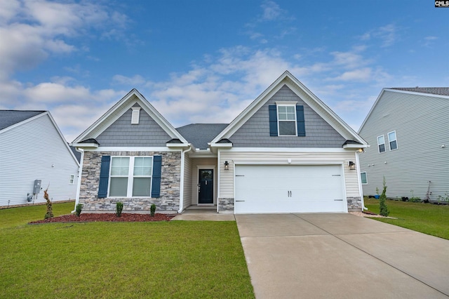 craftsman inspired home with a garage and a front lawn