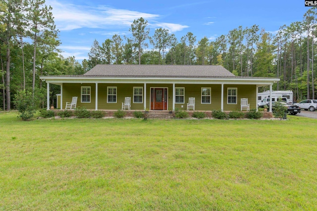 view of front of house with a front yard and covered porch