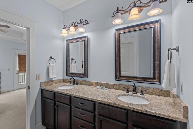 bathroom with vanity and ceiling fan