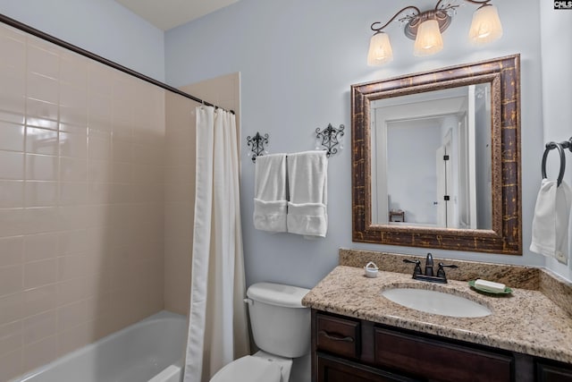 full bathroom featuring shower / bath combo with shower curtain, vanity, and toilet