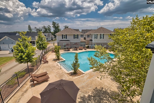 view of swimming pool featuring a patio