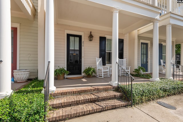 doorway to property with a porch