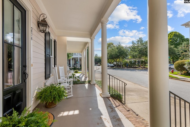 view of patio featuring a porch