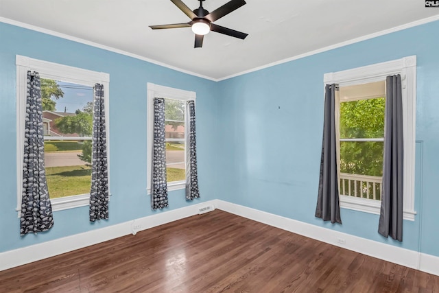 unfurnished room featuring crown molding, hardwood / wood-style floors, and ceiling fan