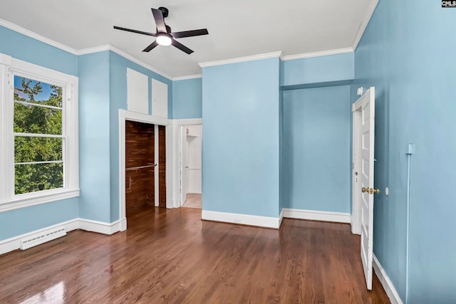 unfurnished bedroom featuring ornamental molding, dark hardwood / wood-style flooring, and ceiling fan