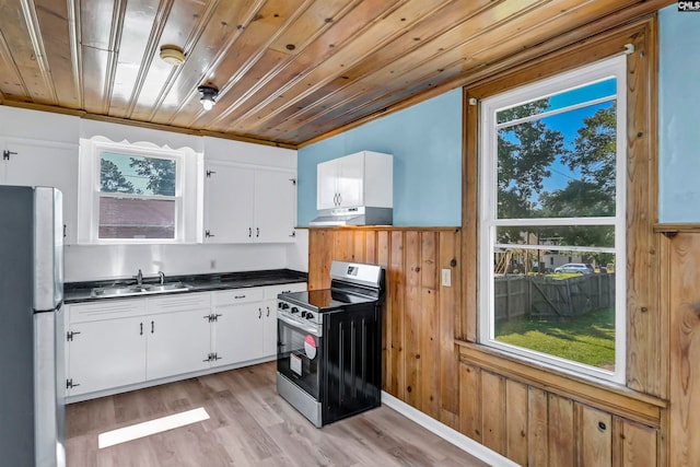 kitchen with stainless steel appliances, white cabinets, light wood-type flooring, and sink