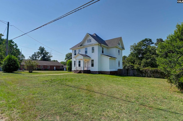 view of front of house with a front lawn