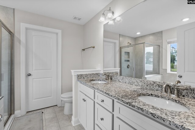 bathroom featuring ceiling fan and vanity