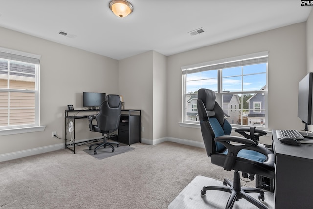 office area with light colored carpet and plenty of natural light