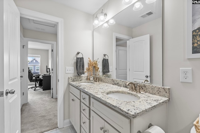 bathroom featuring vanity