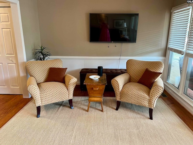 sitting room featuring hardwood / wood-style flooring