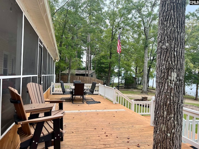 deck with a sunroom