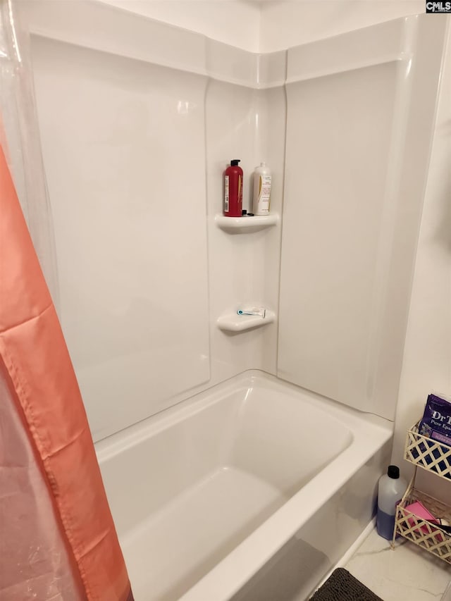 bathroom featuring shower / tub combo