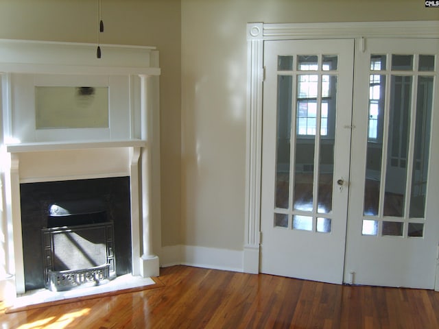 interior space with dark hardwood / wood-style flooring