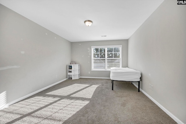 unfurnished room featuring carpet floors