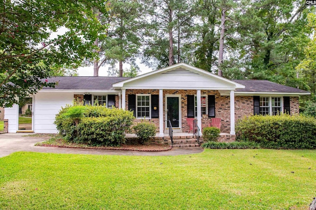 ranch-style home with a front yard, a porch, and a garage