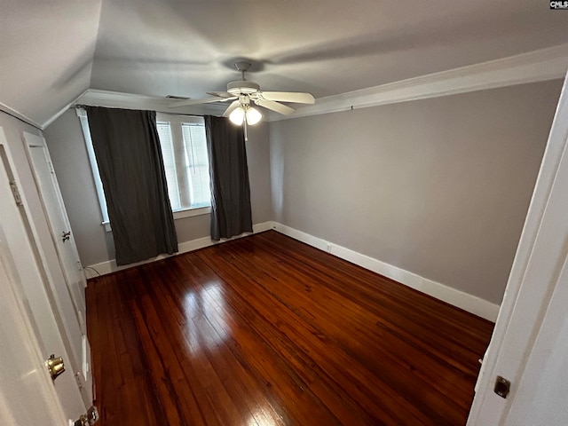 interior space featuring wood-type flooring, vaulted ceiling, ceiling fan, and ornamental molding