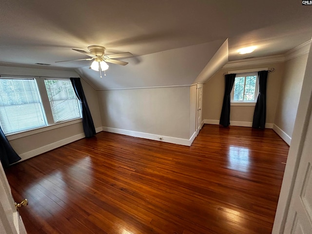 bonus room featuring lofted ceiling, dark wood-type flooring, and ceiling fan